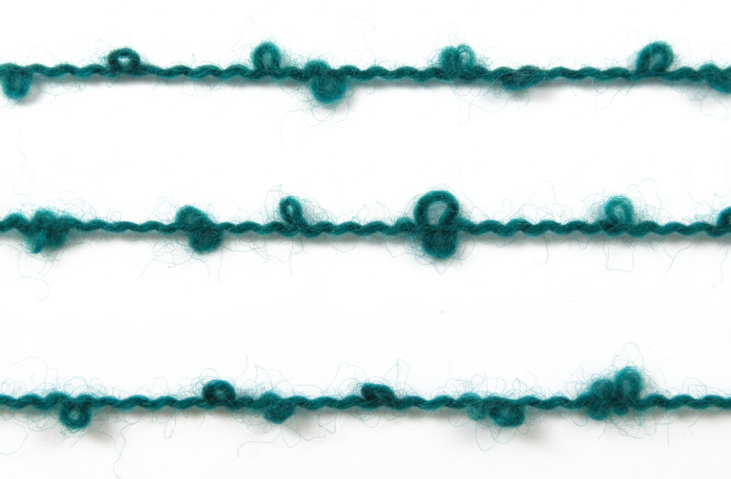 Boucle, loop or curl yarn
